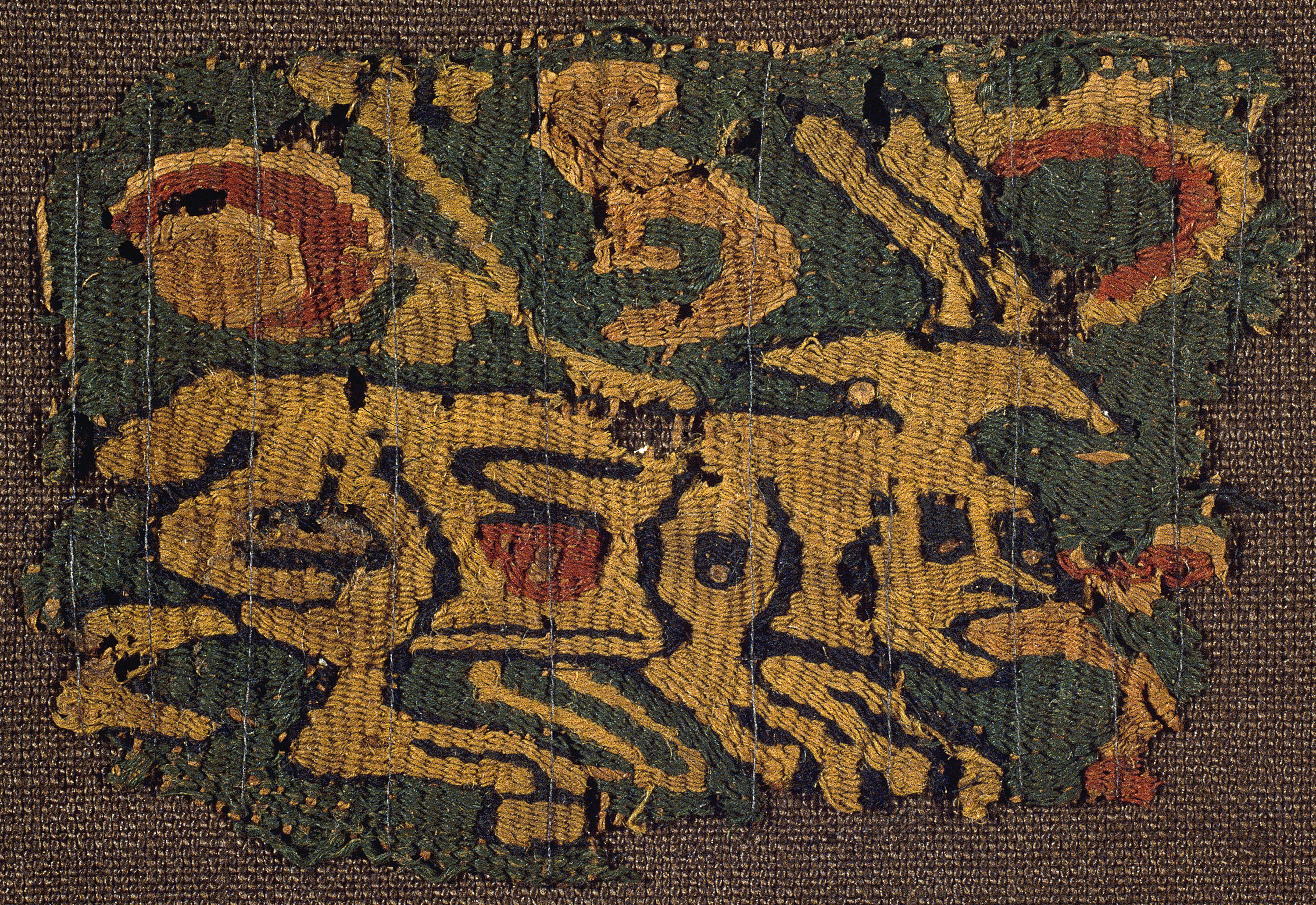 image for: Anònim - Fragment de teixit copte amb quadrúpede - Egipte, segle IX