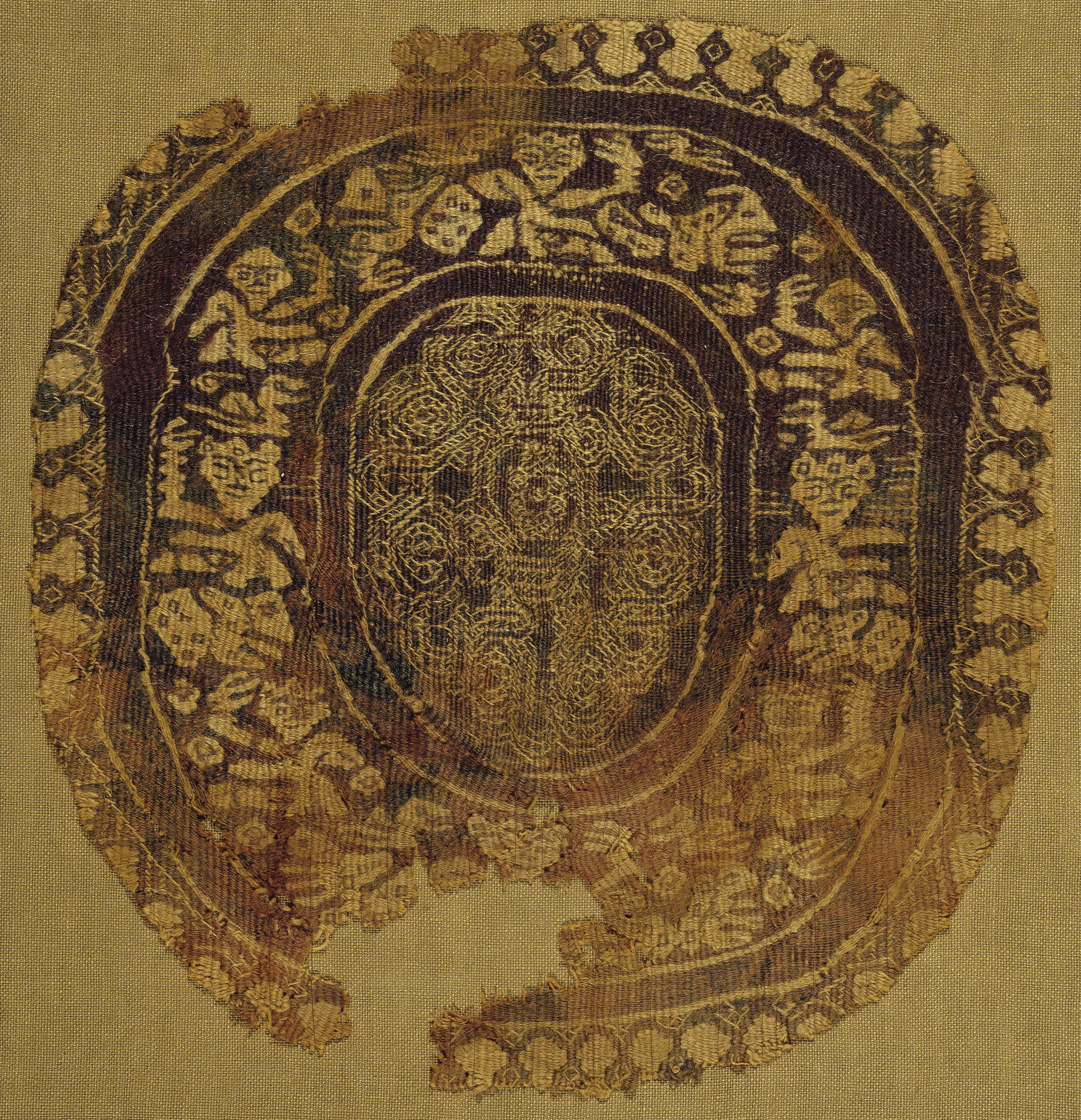 image for: Anònim - Fragment de teixit copte amb «Orbiculus» - Egipte, segles X-XI