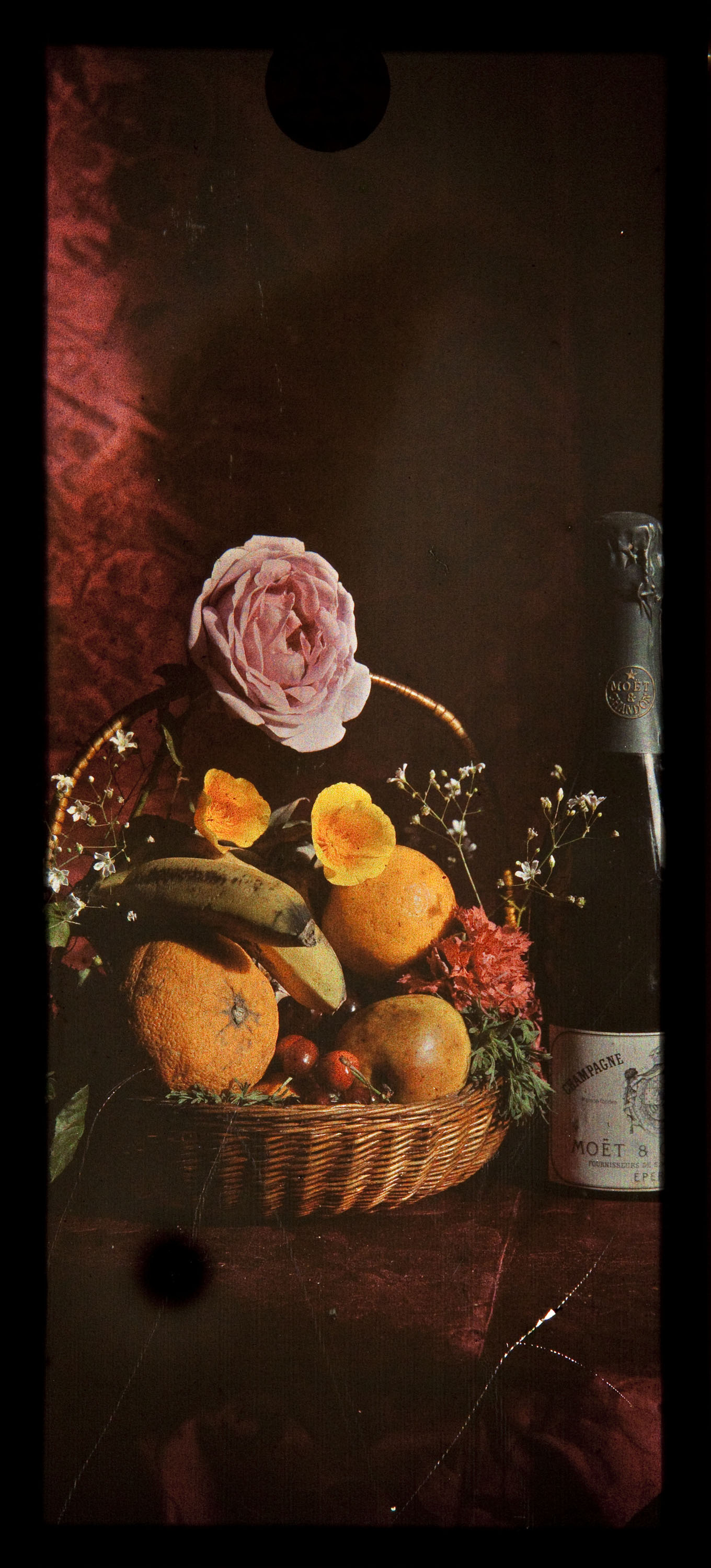 image for: Francesc Carrera Bou - Natura morta amb fruita, flors i ampolla de xampany - Cap a 1922-1926