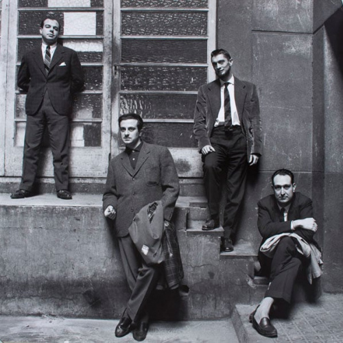 image for: Oriol Maspons - Jaime Gil de Biedma, Carlos Barral, José Agustín Goytisolo i Josep Maria Castellet al vestíbul de l&#039;editorial Seix Barral - 1961